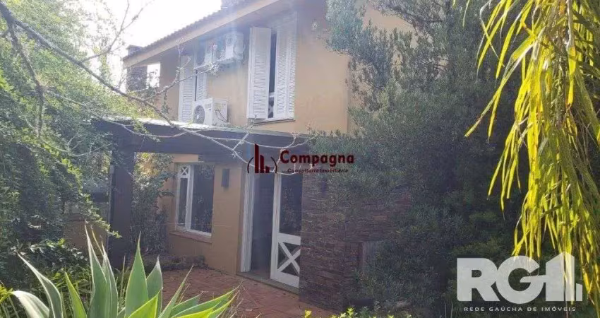 Casa em condomínio fechado com 3 quartos à venda na Rua Professor Carlos de Paula Couto, 500, Cavalhada, Porto Alegre