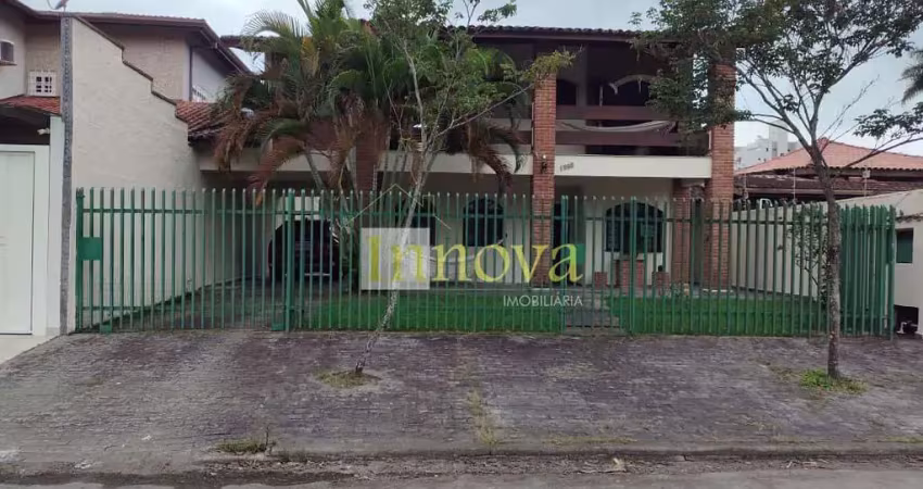 Imóvel à venda com 286m² de terreno, a 400m da orla do indaiá, com  suítes avarandadas, em caraguat