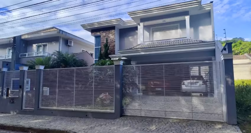 Linda casa com 1 suíte mais 1 demi-suíte (2 quartos) à venda no bairro bom retiro em joinville - sc por r$ 1.490.000,00.