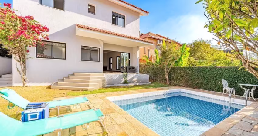 Casa com 5 suítes, piscina, churrasqueira e lareira na melhor rua do alphaville residencial 9