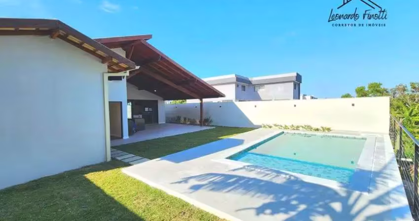 Casa linear com 4 suítes condomínio arquipélago de manguinhos