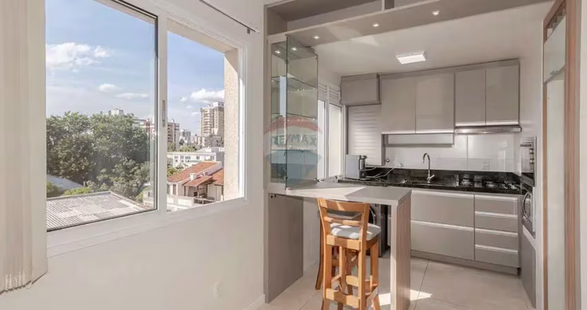 Apartamento à venda no bairro menino deus com 1 dormitório, vaga e elevador: compacto e elegante!