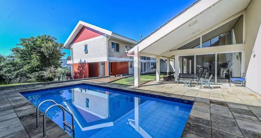 Casa com 4 quartos à venda na Rua Paulo Madureira Coelho, 480, Alto Petrópolis, Porto Alegre