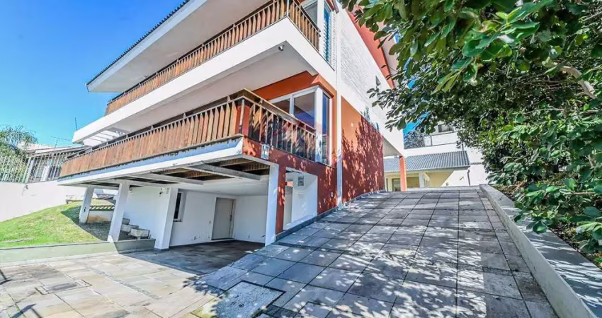 Casa com 4 quartos à venda na Rua Paulo Madureira Coelho, 480, Alto Petrópolis, Porto Alegre
