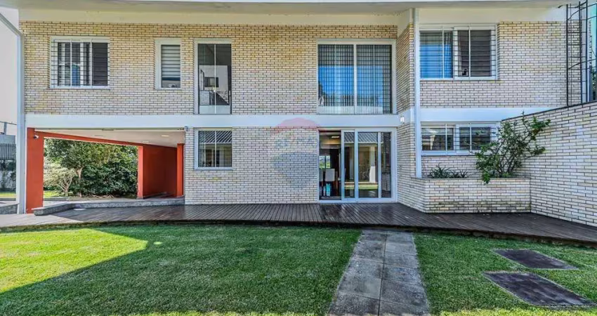 Casa com 4 quartos à venda na Rua Paulo Madureira Coelho, 480, Alto Petrópolis, Porto Alegre