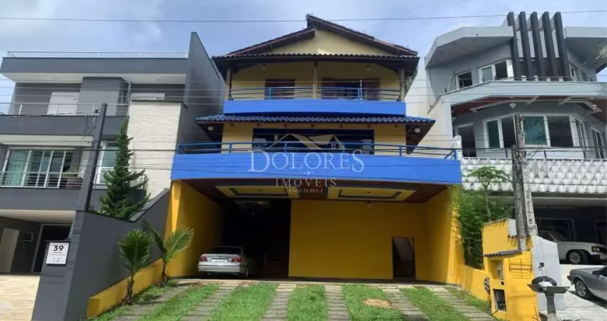 Bela casa com 4 dormitórios sendo 1 suíte máster no condomínio aruã em mogi das cruzes.