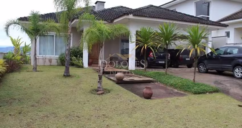 Bela casa térrea com 4 suítes no condomínio monterrey