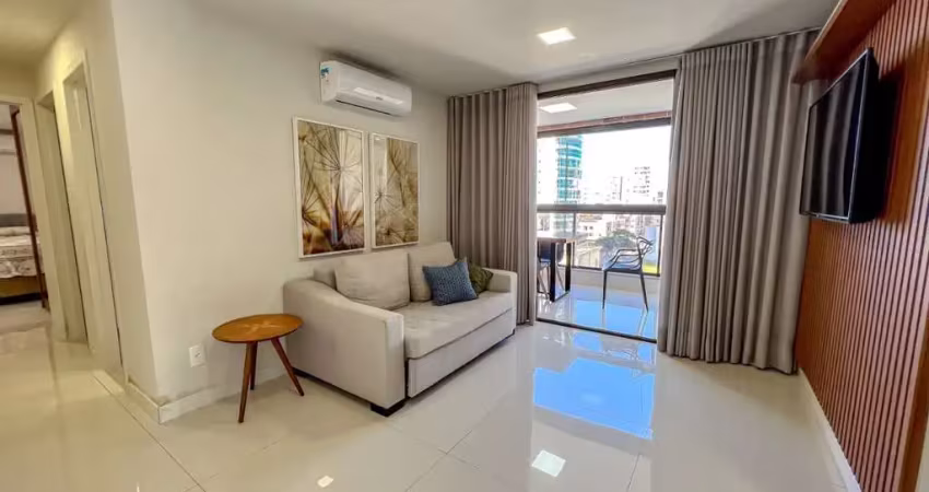 Apartamento de 2 quartos sendo 1 suíte a venda na praia do morro em prédio a beira mar com lazer completo na cobertura