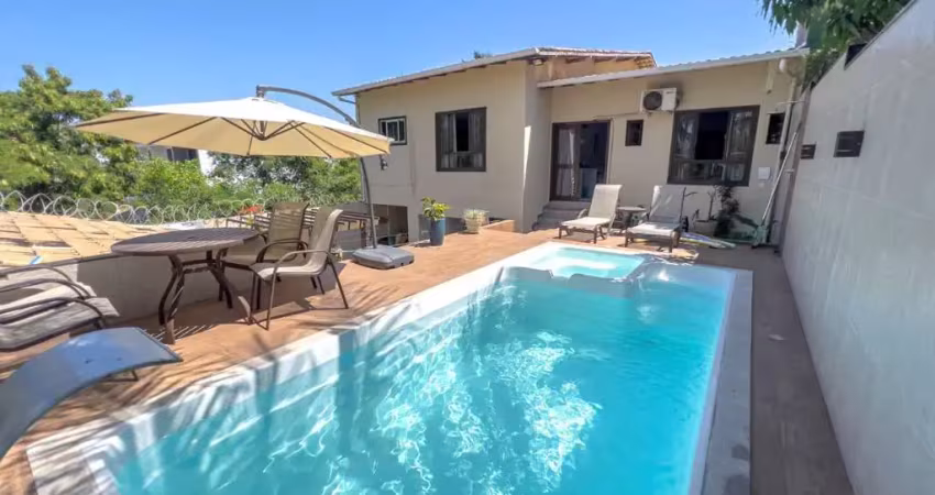 Casa duplex à venda em nova guarapari com 4 suítes, piscina e área gourmet. um luxo!