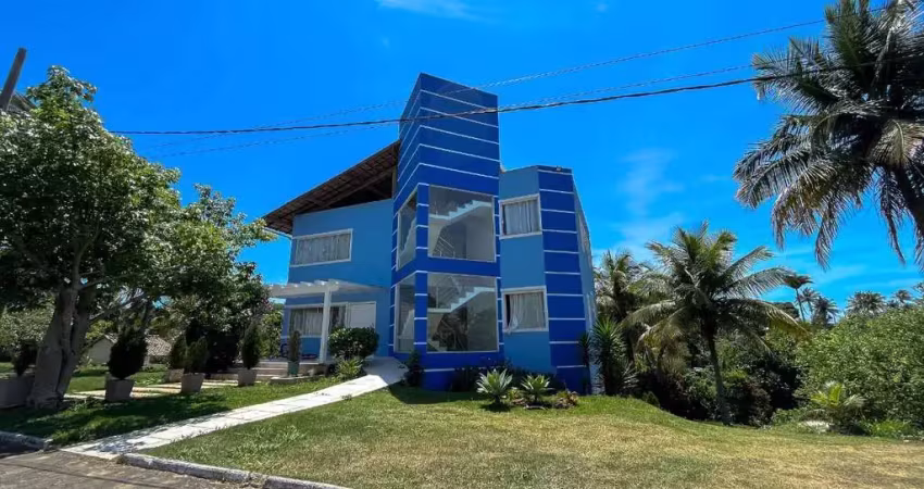 Casa com excelente area externa à venda no condomínio lagoa da praia em guarapari/es.