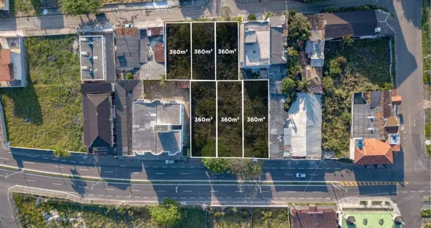 Terreno residencial e comercial à venda na enseada azul de frente para rodovia.