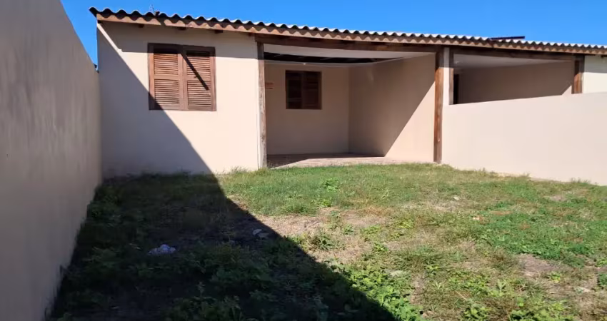 Excelente casa geminada no bairro centro de cidreira escriturada e 100% averbada