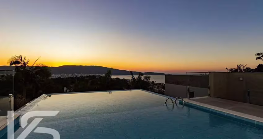 Casa em condomínio fechado com 3 suítes e piscina borda infinita - bombinhas sc