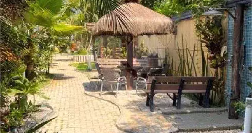 Casa com 3 quartos à venda na Rua Papoula, Camburi, São Sebastião