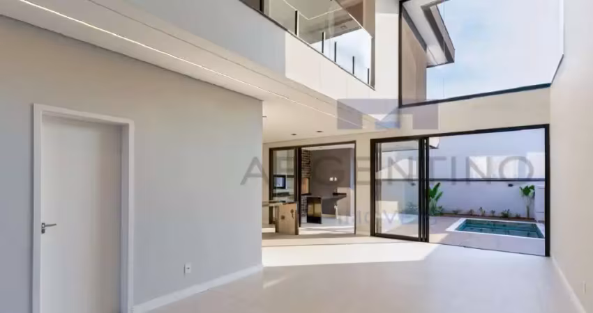 Casa contemporânea com 3 suítes e área gourmet integrada à piscina!