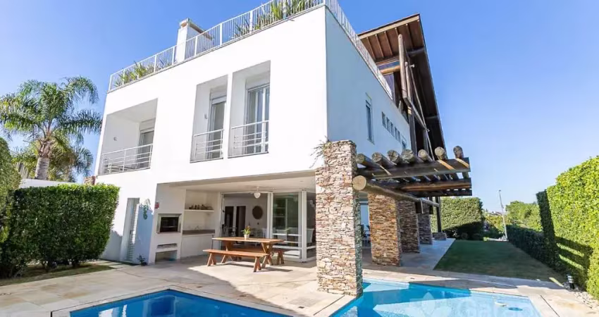 Casa em condomínio fechado com 6 quartos à venda na Rodovia Jornalista Manoel de Menezes, 2129, Barra da Lagoa, Florianópolis