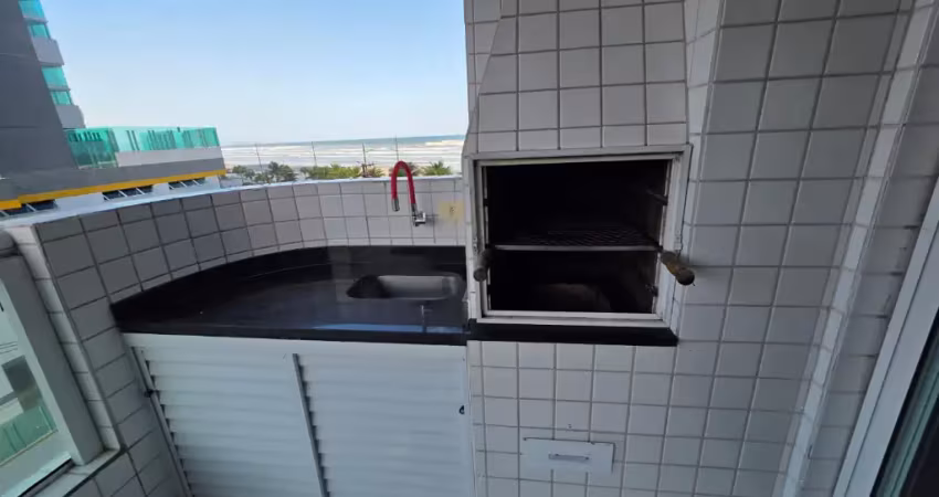 Prédio frente mar com sacada gourmet e churrasqueira carvão.