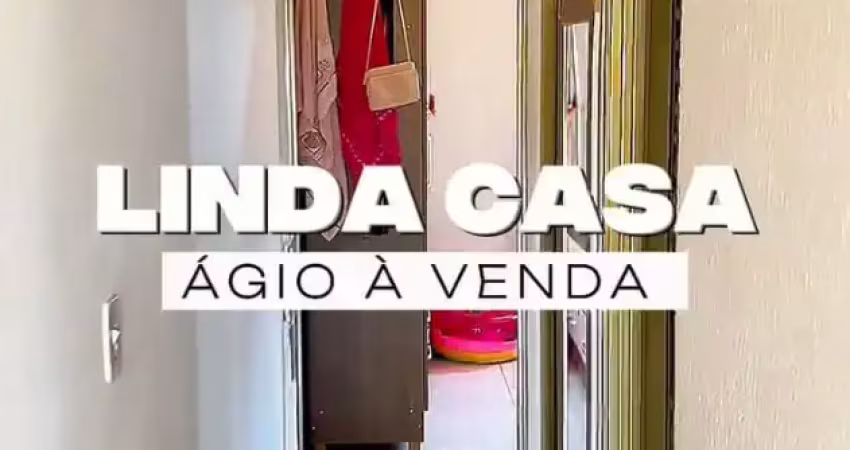 Ágio de uma casa de dois quartos com suíte sala cozinha americana e garagem