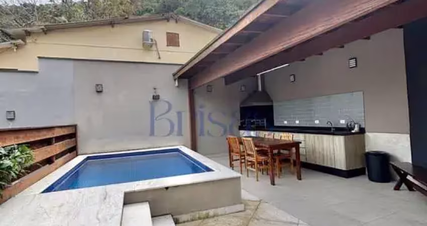 Casa em condomínio fechado com 4 quartos para alugar na Rua Olímpio Faustino, Camburi, São Sebastião
