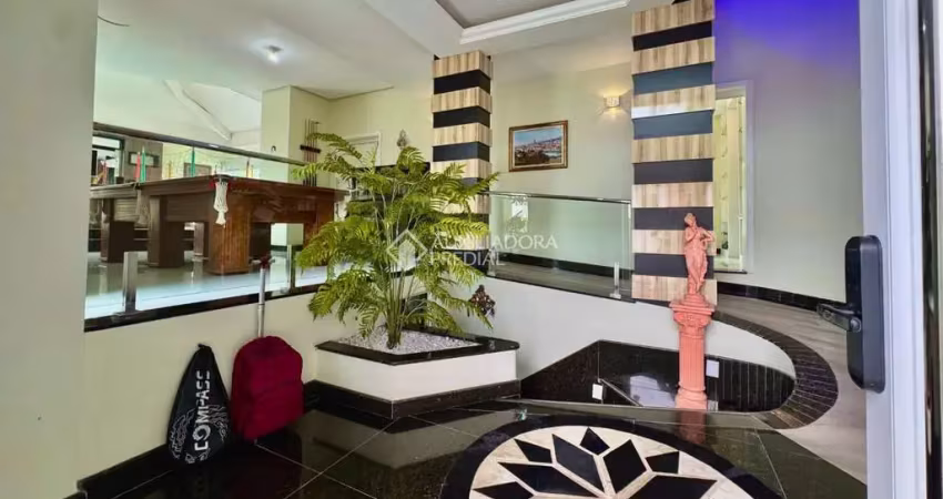 Casa com 4 quartos à venda na Rua Assunção, 215, Jardim Lindóia, Porto Alegre