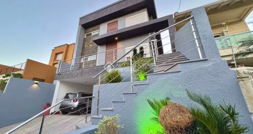 Casa com 3 quartos à venda na Rua Verdes Campos, 110, Mário Quintana, Porto Alegre