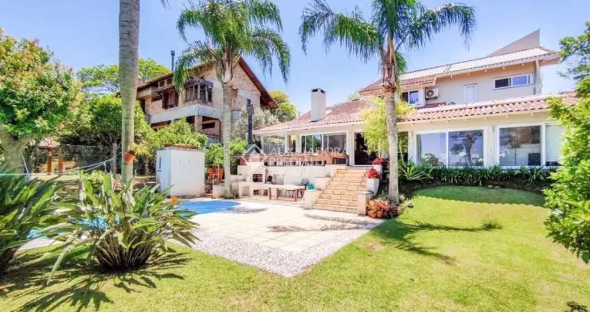 Casa em condomínio fechado com 3 quartos à venda na Avenida Firmino Octávio Bimbi, 255, Cavalhada, Porto Alegre