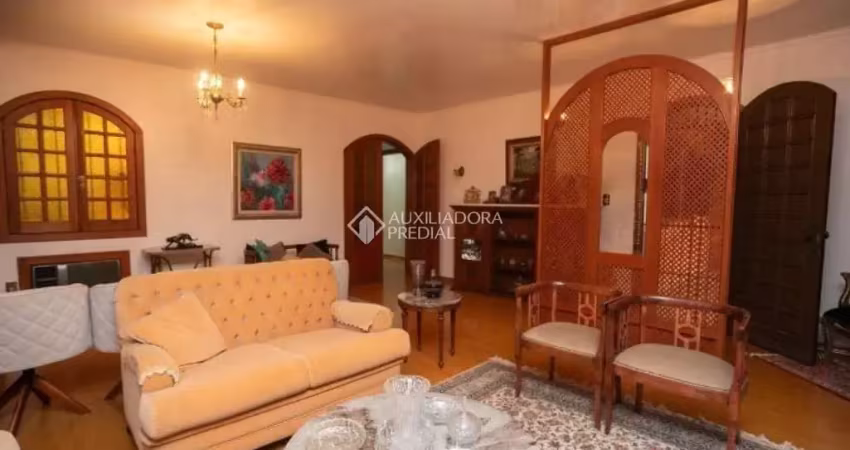 Casa com 4 quartos à venda na Rua Eudoro Berlink, 599, Auxiliadora, Porto Alegre