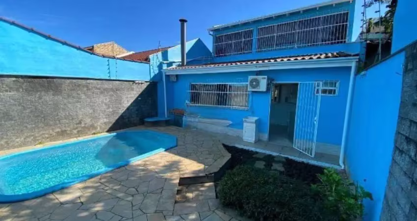 Casa com 2 quartos à venda na Rua Condores, 376, Jardim Algarve, Alvorada