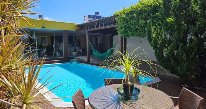 Casa 4 suítes, 399m², piscina e gourmet em capim macio — alto padrão